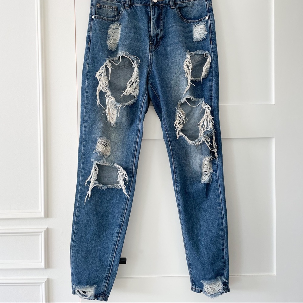 Highly Distressed Medium Wash Denim